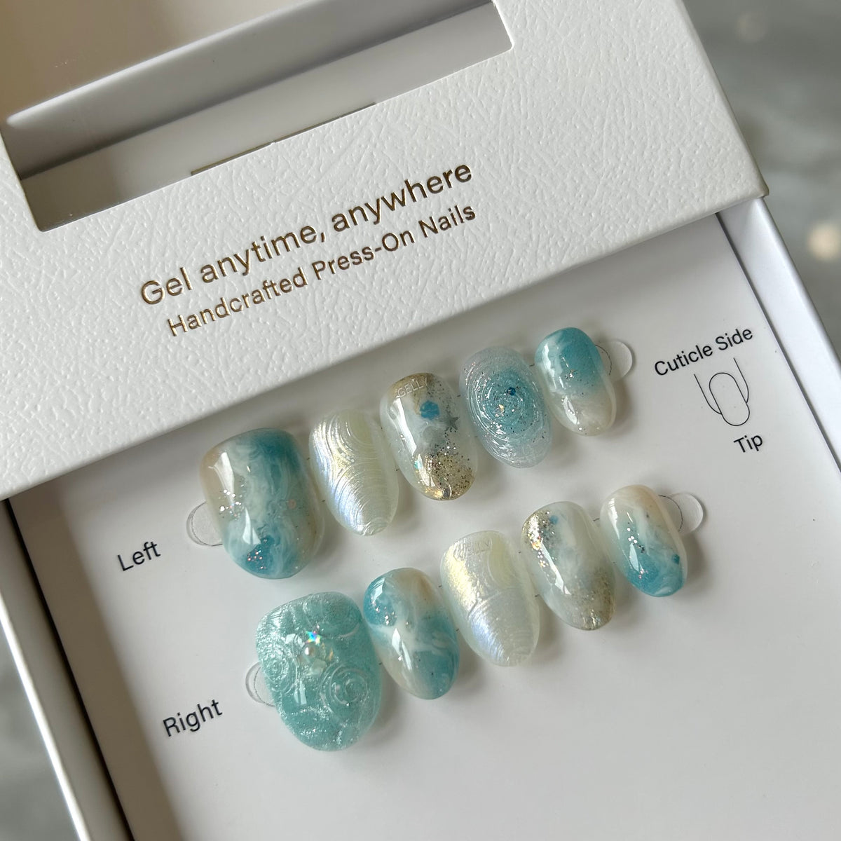 Set of GELLY press-on nails with blue and white designs