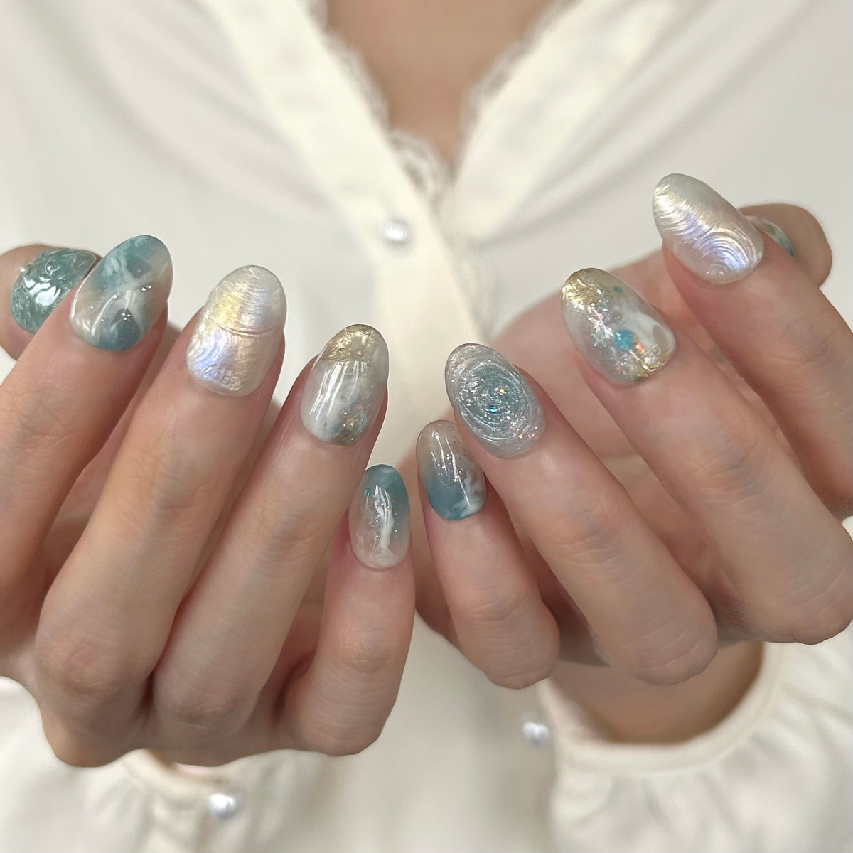 Close-up of hands with GELLY press on nails